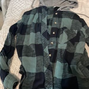 Flannel it’s green and black worn a couple of times and in good condition